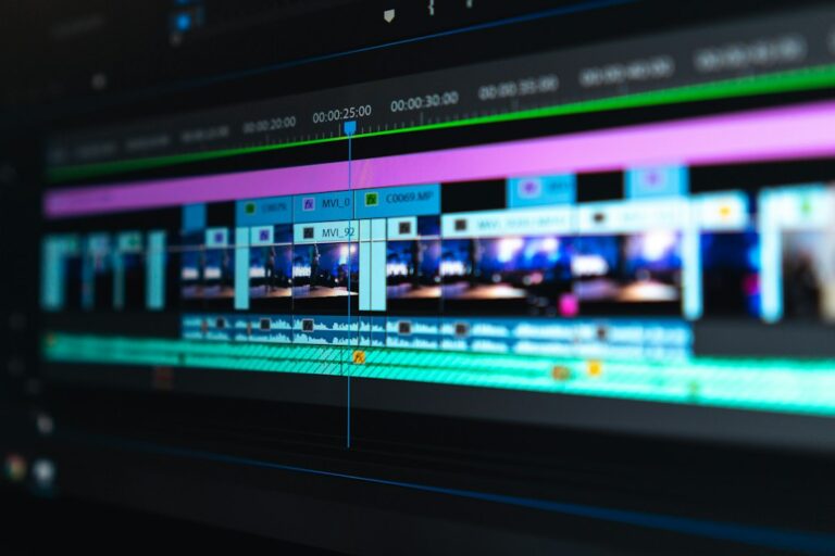 A close-up of video clips and audio tracks on an editing timeline.