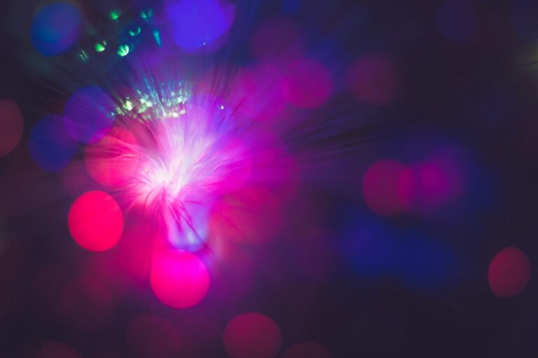 Colored points of light along fine illuminated strands
