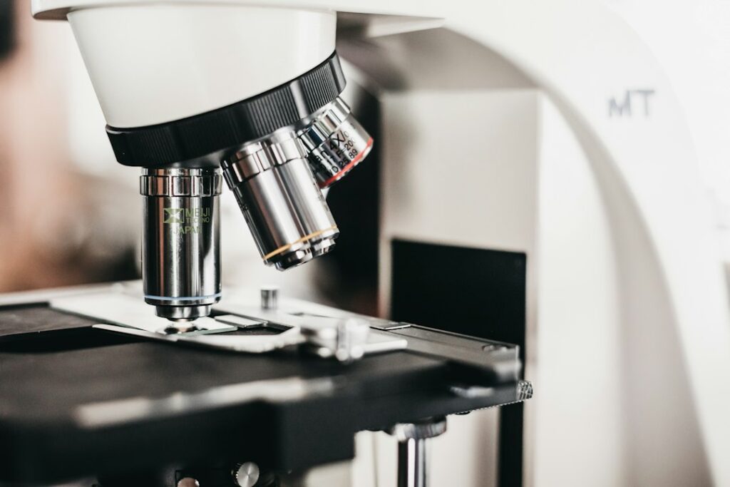 Close-up of a laboratory microscope and its objective lenses