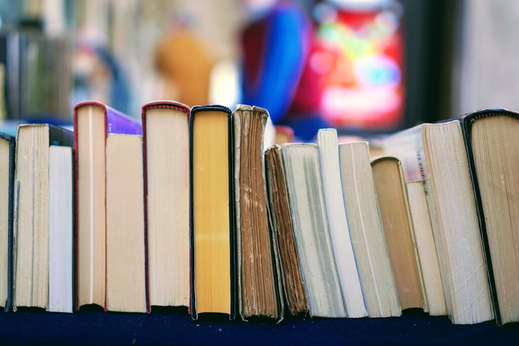 A row of books with their pages facing outward